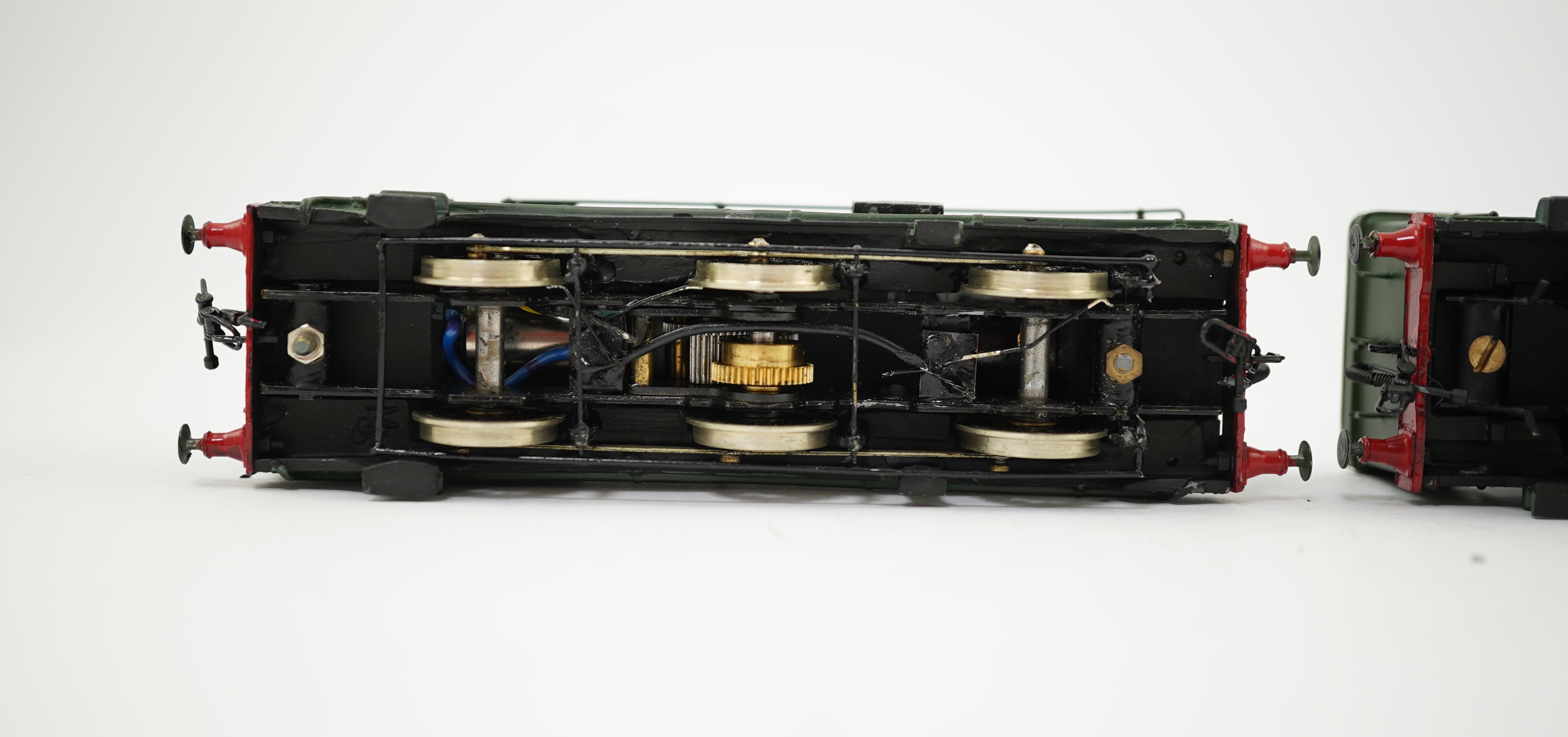 Two 00 gauge brass and white metal kit built GWR tank locomotives; a 2021 class 0-6-0PT, 2032, together with an 1854 class 0-6-0ST, 1858, constructed, painted and lined to a high standard, both motored for two rail opera
